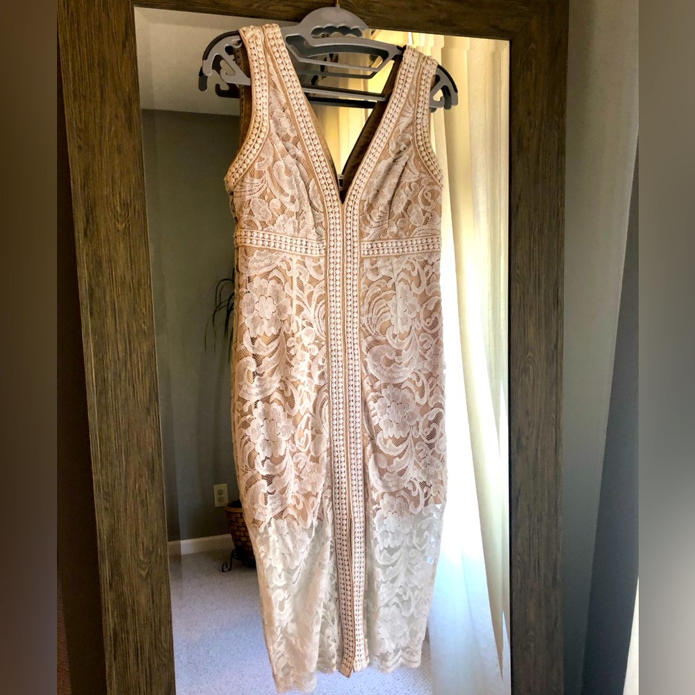 Stunning dress for rehearsal dinner, bridal shower, or even wedding!